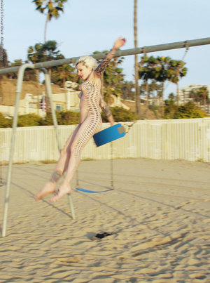 18 year old cutie Jessica Doltin strips naked atop a four wheeler on the patio